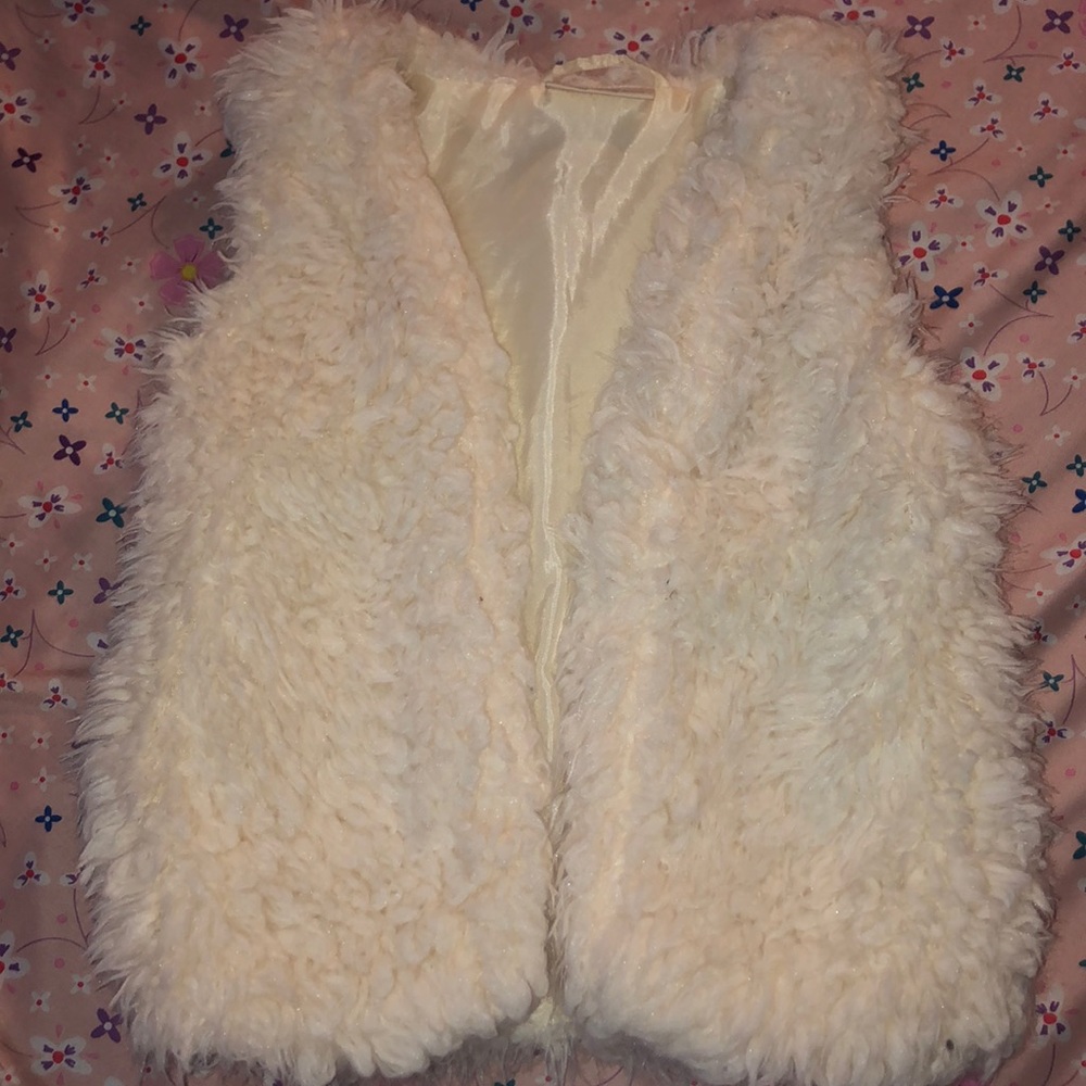 Fluffy white vest
